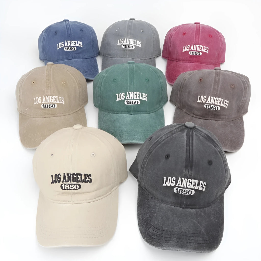 Retro distressed personalised baseball cap with embroidered letters on the front, showing adjustable strap.
