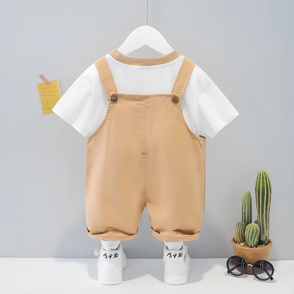 Cotton baby overalls with cartoon patterns in yellow, pink, and khaki colours