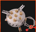 Camping stove with seven burners set on a stable steel frame for group outdoor cooking