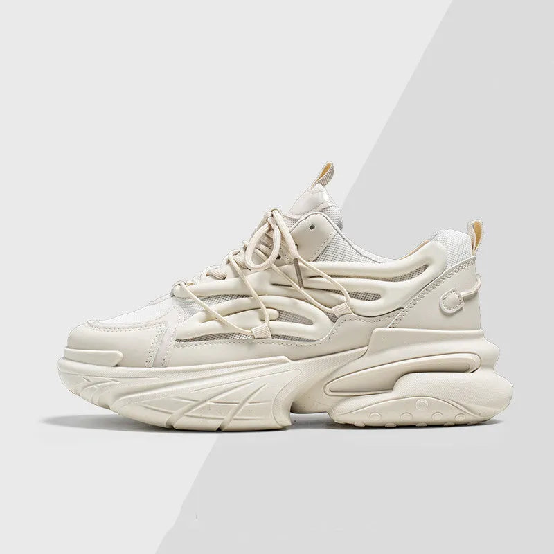 Men's low-top sneakers in beige with mesh upper, rubber sole, and front lace-up design on a white background.