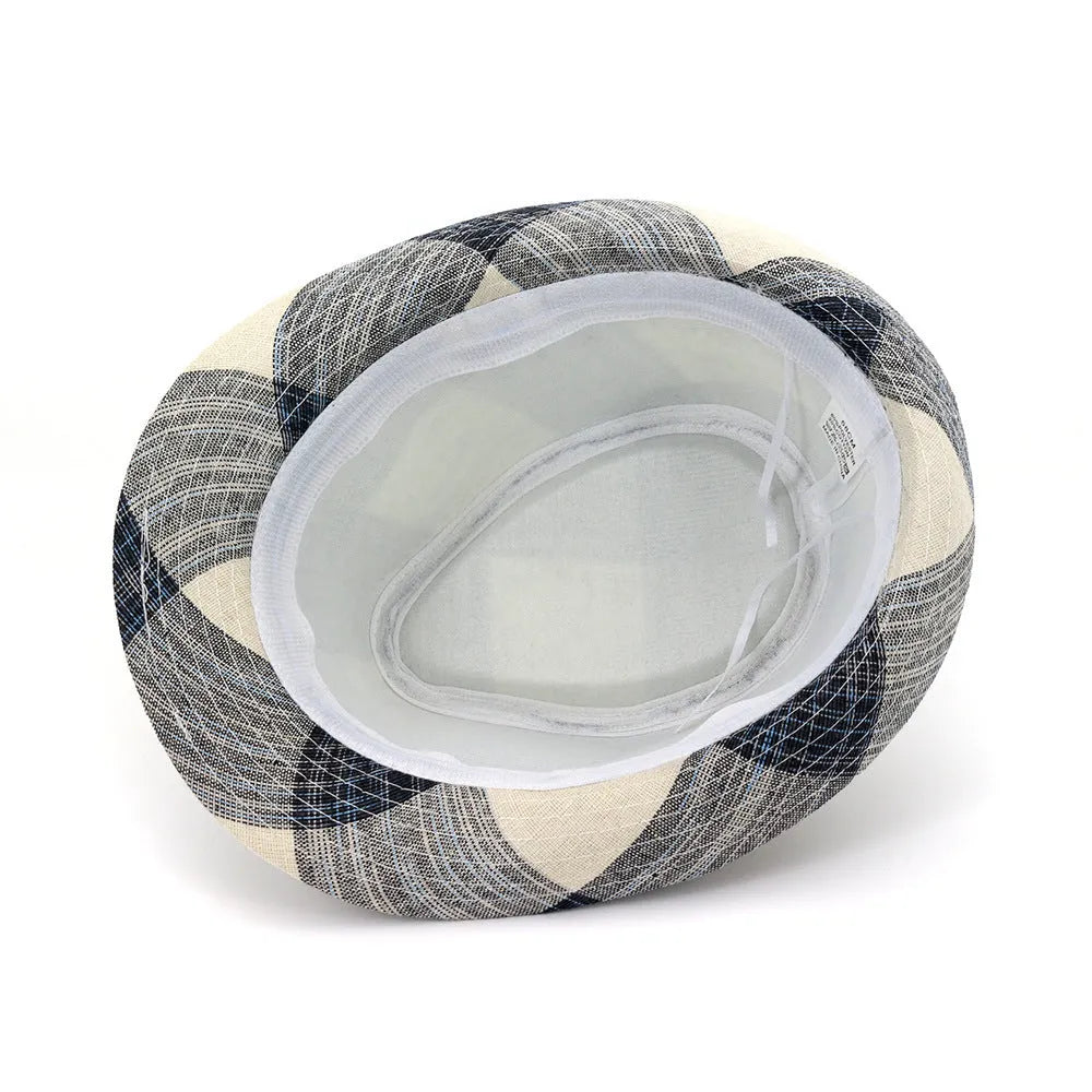 Casual blue polyester sun hat with a wide brim and bell-shaped crown on a wooden background.