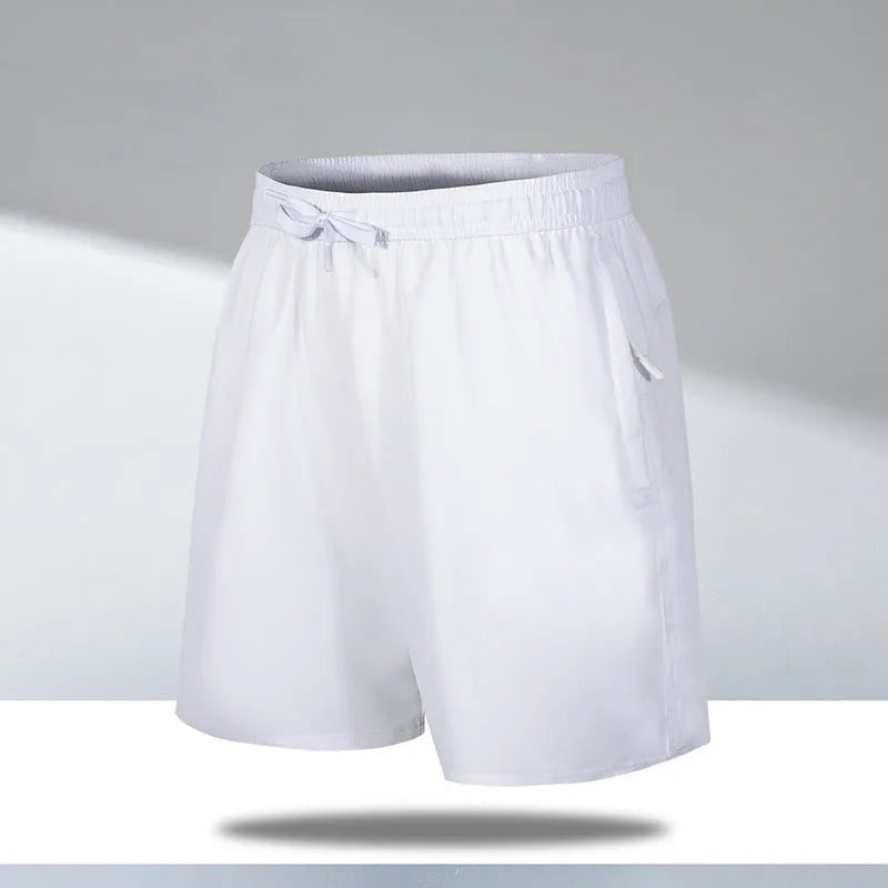 Man wearing loose fit quick-dry polyester beach shorts in a summer colour