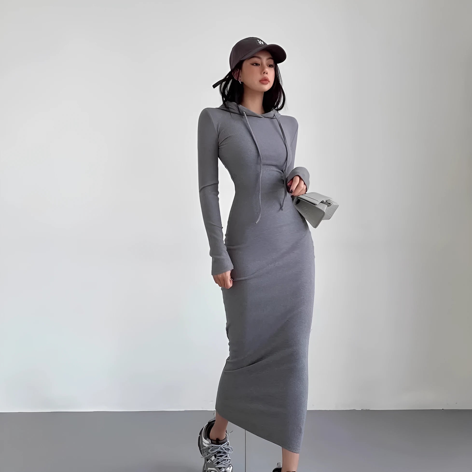 Women's grey hooded sheath dress with long sleeves and high waist design