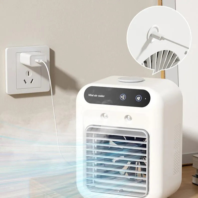 Ivory white portable air cooler with touchscreen panel and USB cable on a desk