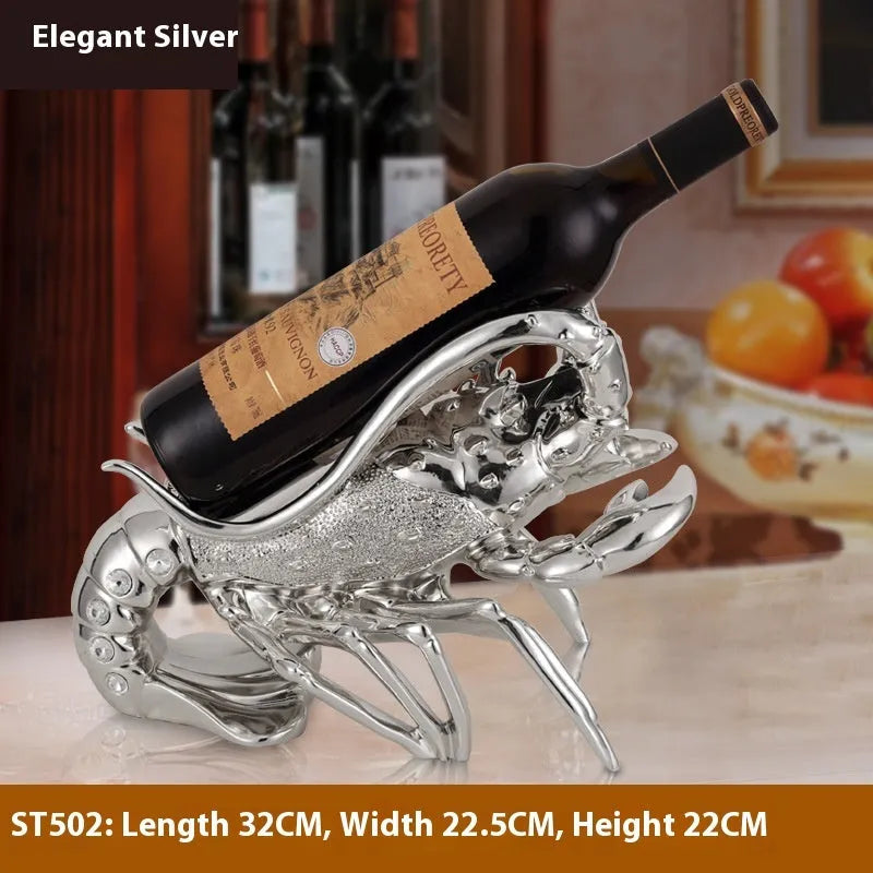Lobster-shaped decorative wine rack ornament in rose gold or silver finish on a tabletop.