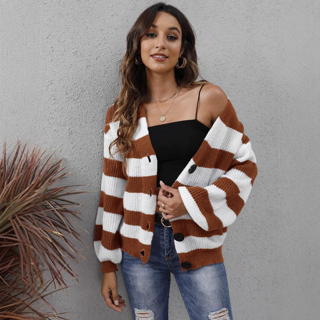 Women's striped cardigan sweater in deer plush fabric with button stitching.