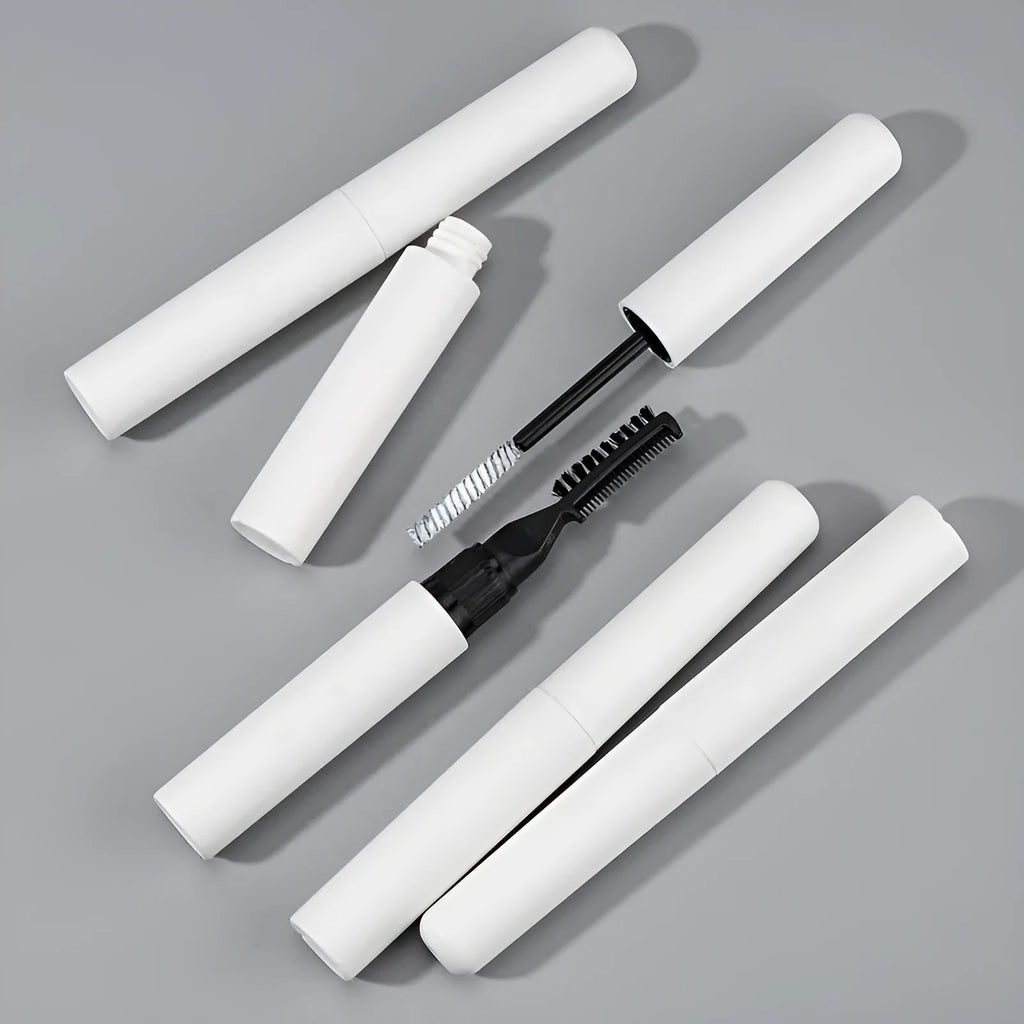 Eyebrow styling gel applicator in white or pink for natural brow shaping and long-lasting hold