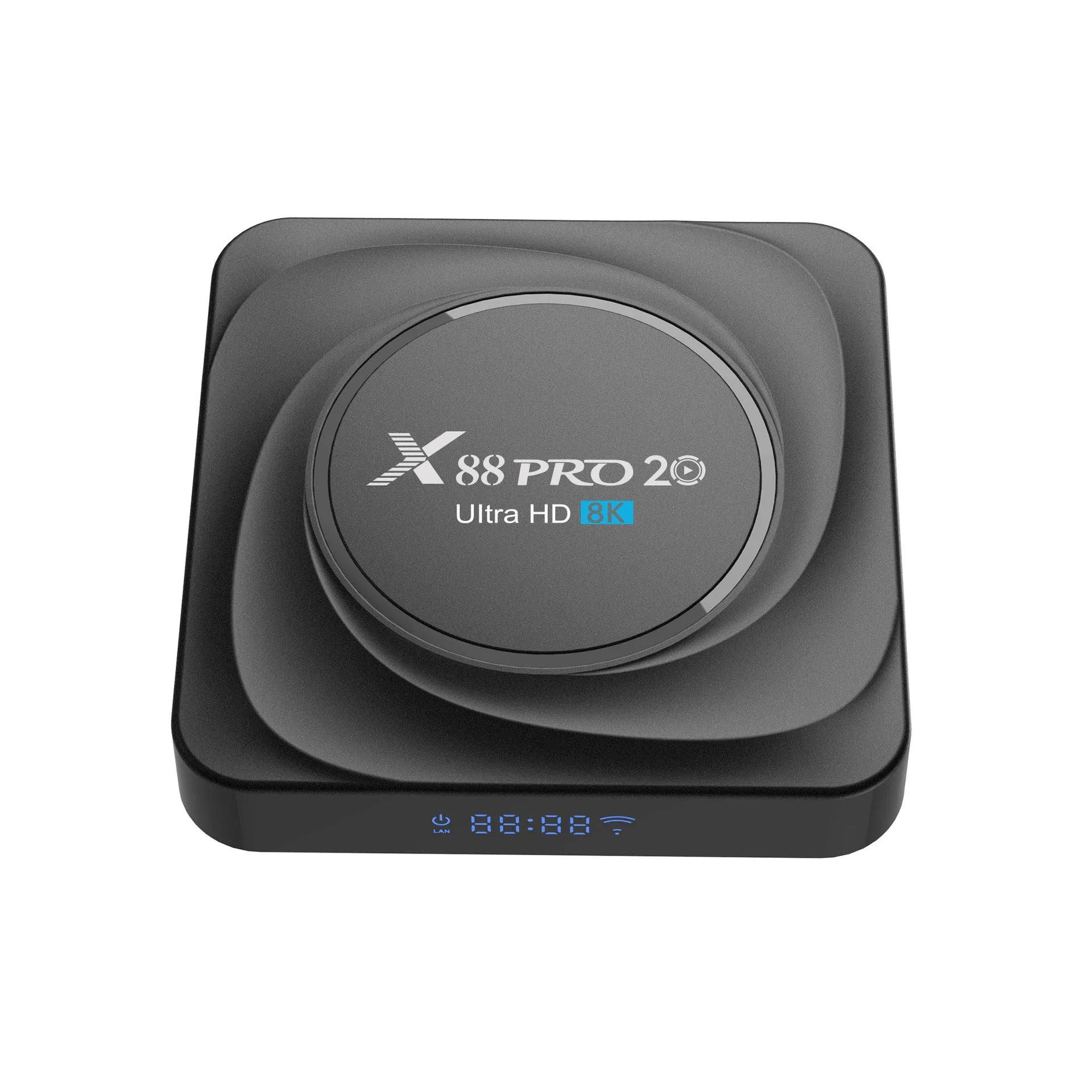 Black Android TV set-top box with HDMI port, shown with remote control and UK plug power adapter.