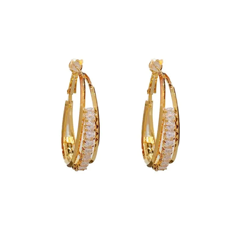 Zircon oval earrings in thick gold plated copper with geometric round shape, fashion OL style