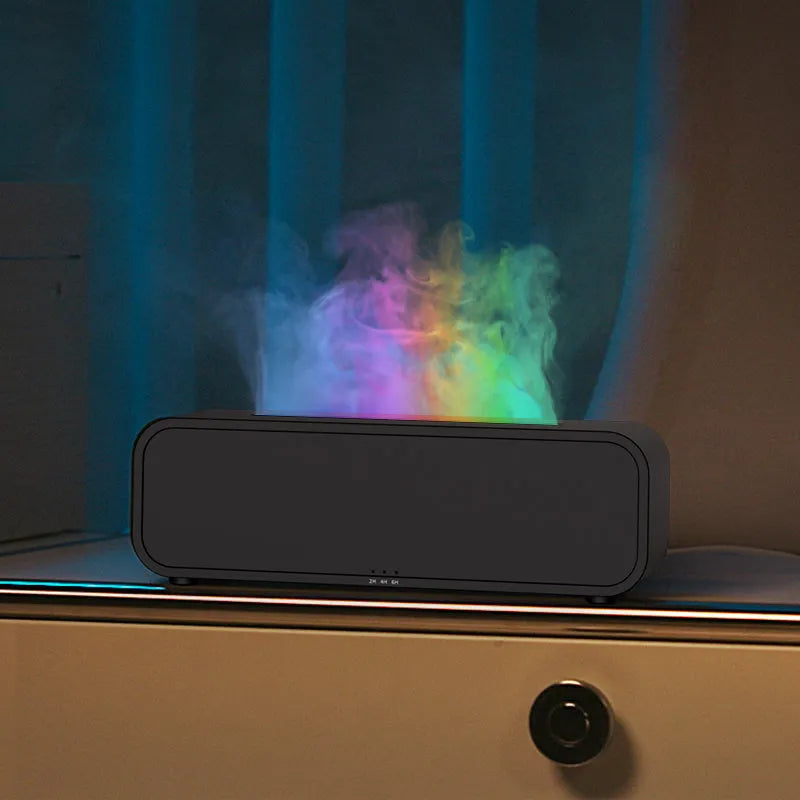 Black and white aromatherapy diffuser with flame LED effect and remote control on wooden surface