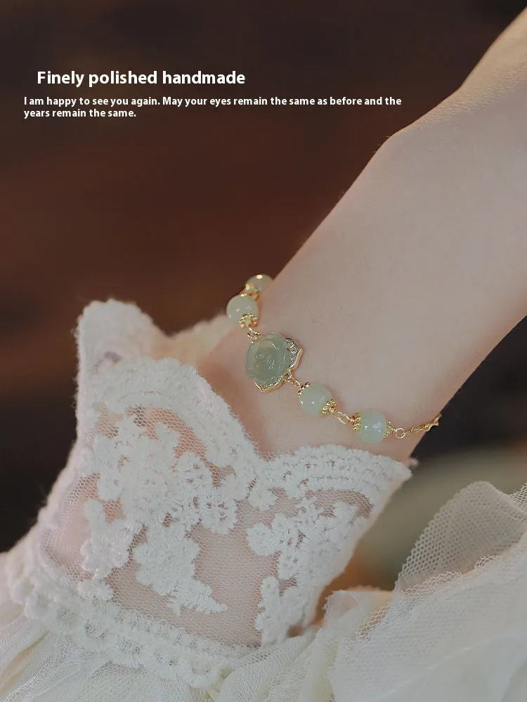 Original design Hetian Jade Rose colour jade bracelet with floral shape, rose motif, and 14K gilded accents for women.
