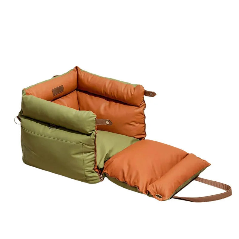 Green removable washable dog car nest with waterproof PU base, shown in a car boot