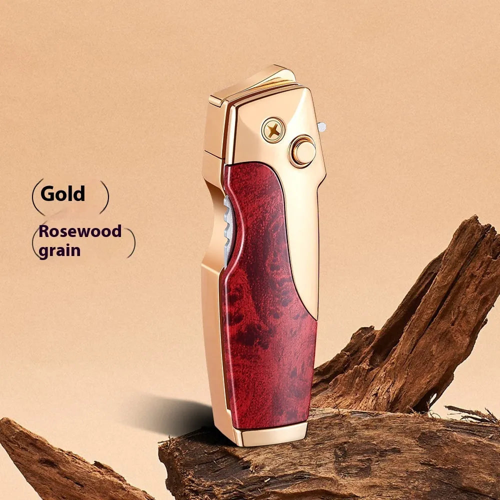 Closed metal folding lighter with integrated knife in a carbon fibre finish, showing the safety lock and refill valve.