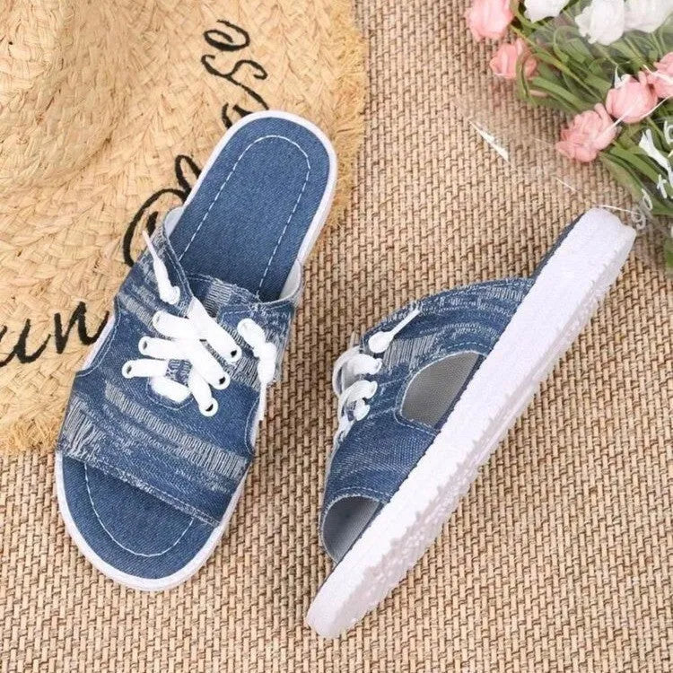 Blue Roman style women's canvas slippers with cloth lining and rubber soles