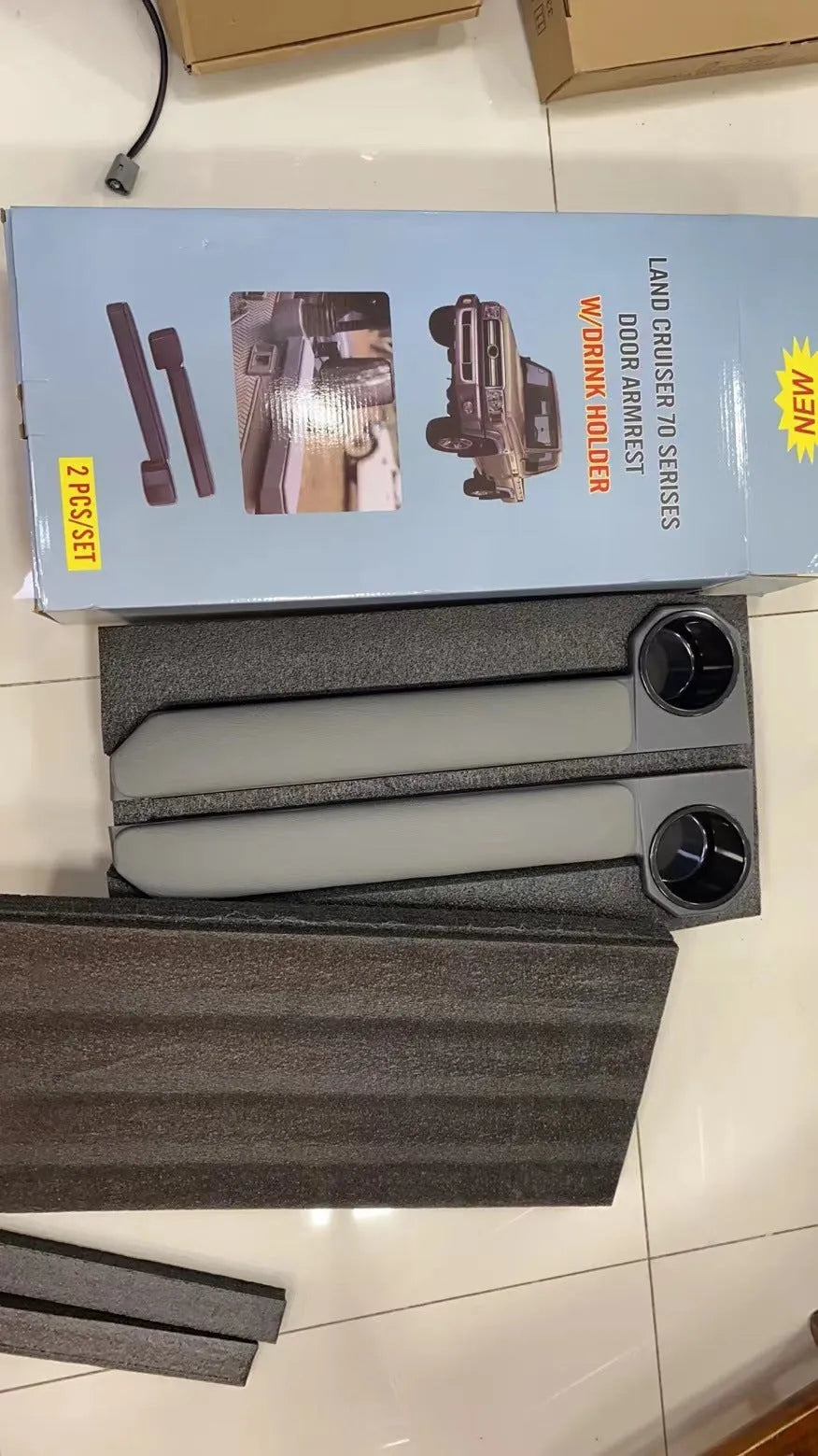 Grey car door armrest ring frame accessory with magnetic attachment