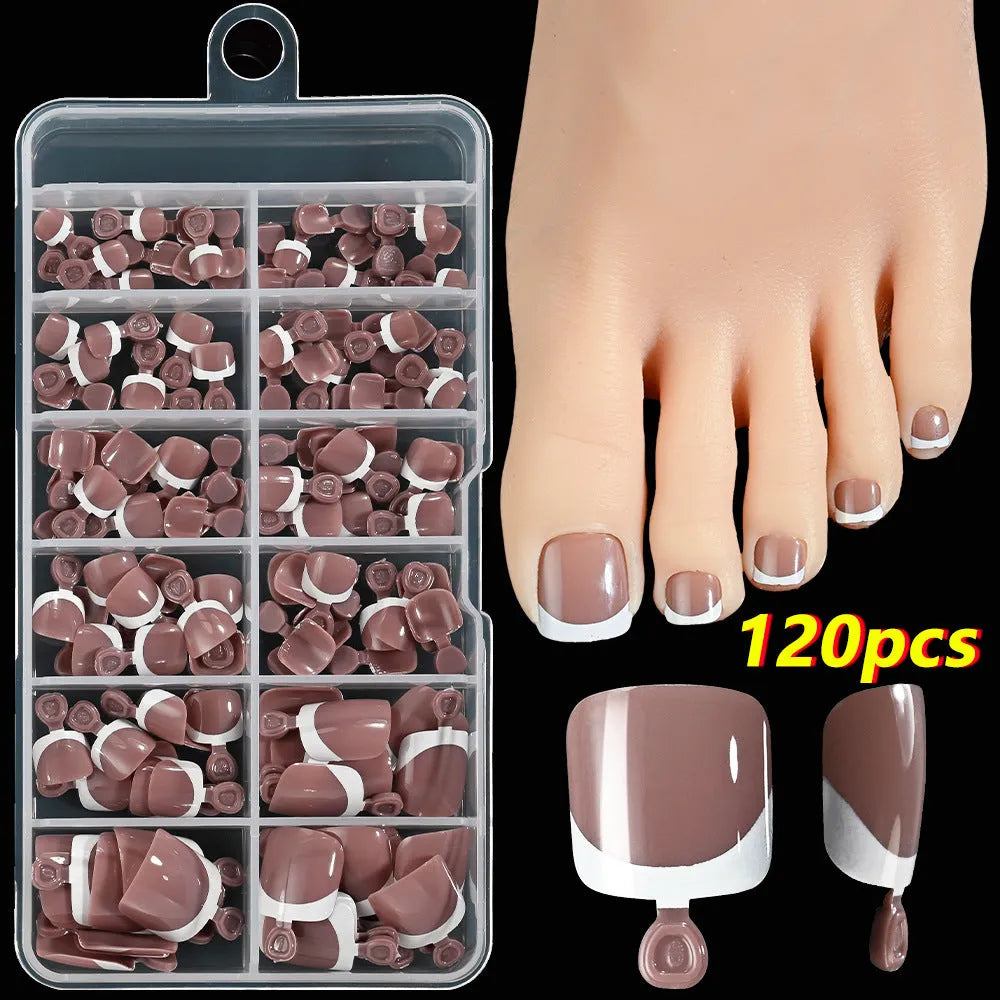 Open box showing 120 French white edge nude square false toe nail pieces in various shades.