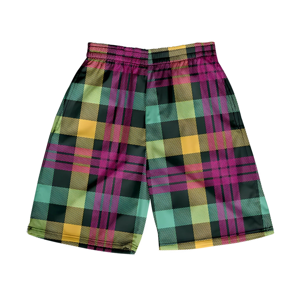 Man wearing straight-leg plaid shorts with an elastic waistband on a beach, showing one of twenty available colour variations.