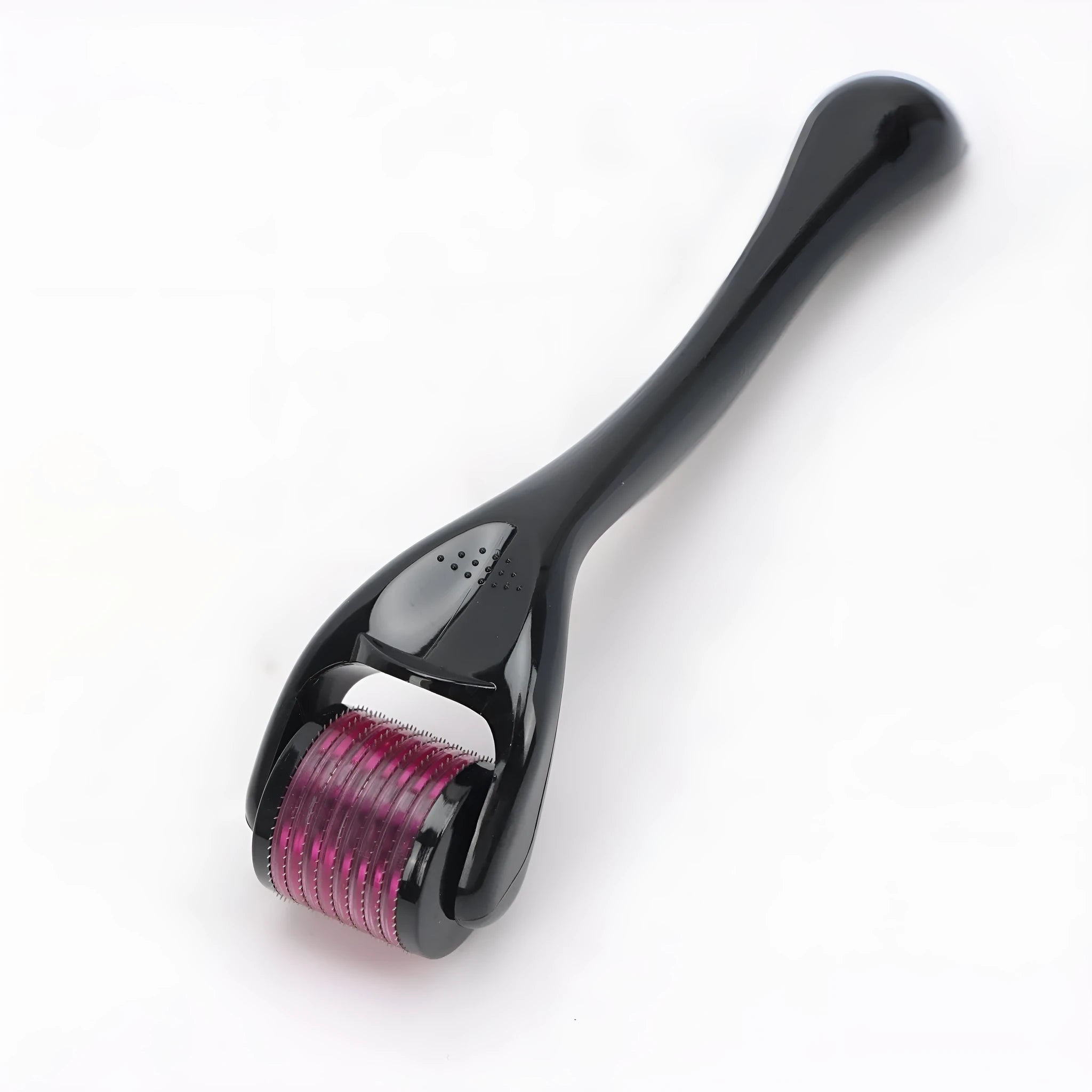 540 micro needle roller tool with black handle and coloured wheel on a white background.