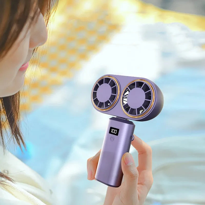 Handheld portable fan with folding neck, digital display and USB charging port