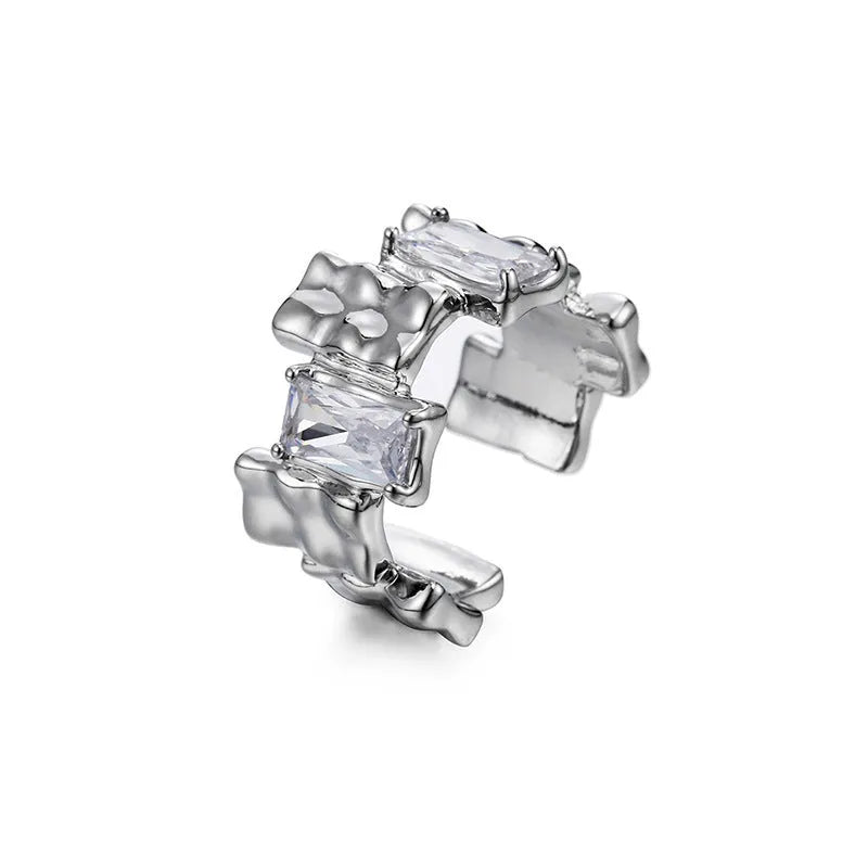 Silver geometric open ring with three-dimensional decoration and cross zircon design