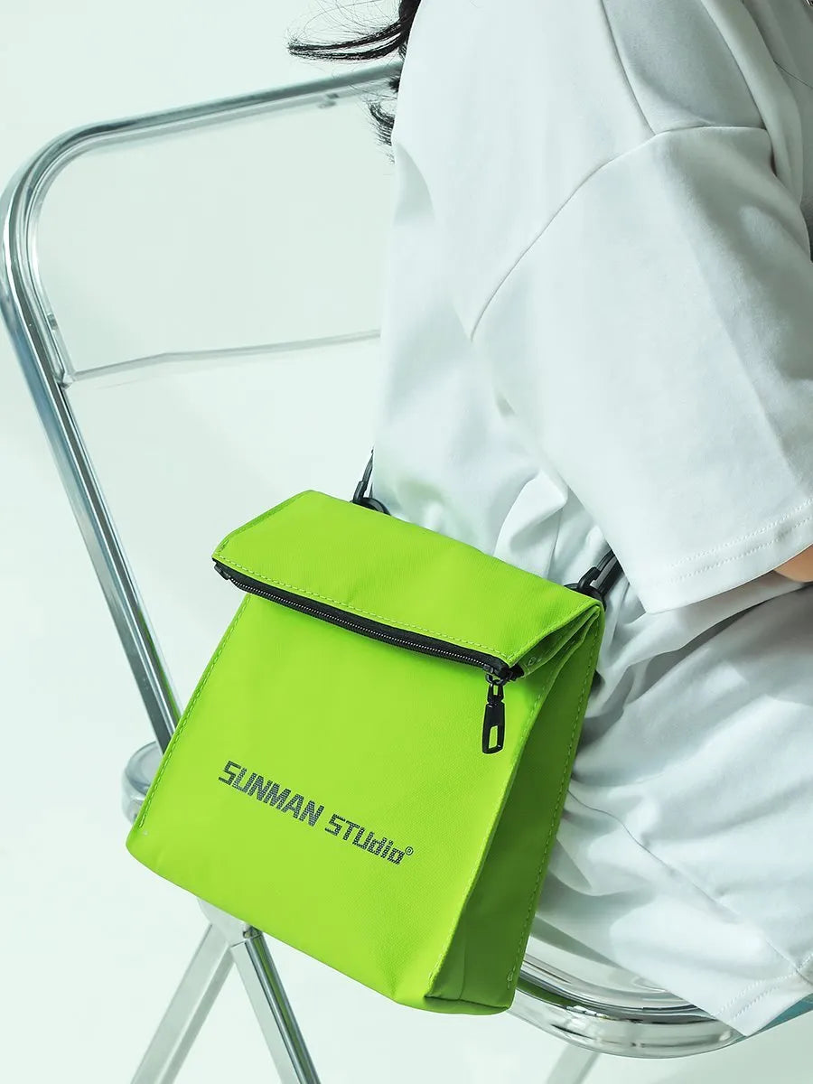 Messenger design backpack in polyester with crossbody strap and sewing line detailing