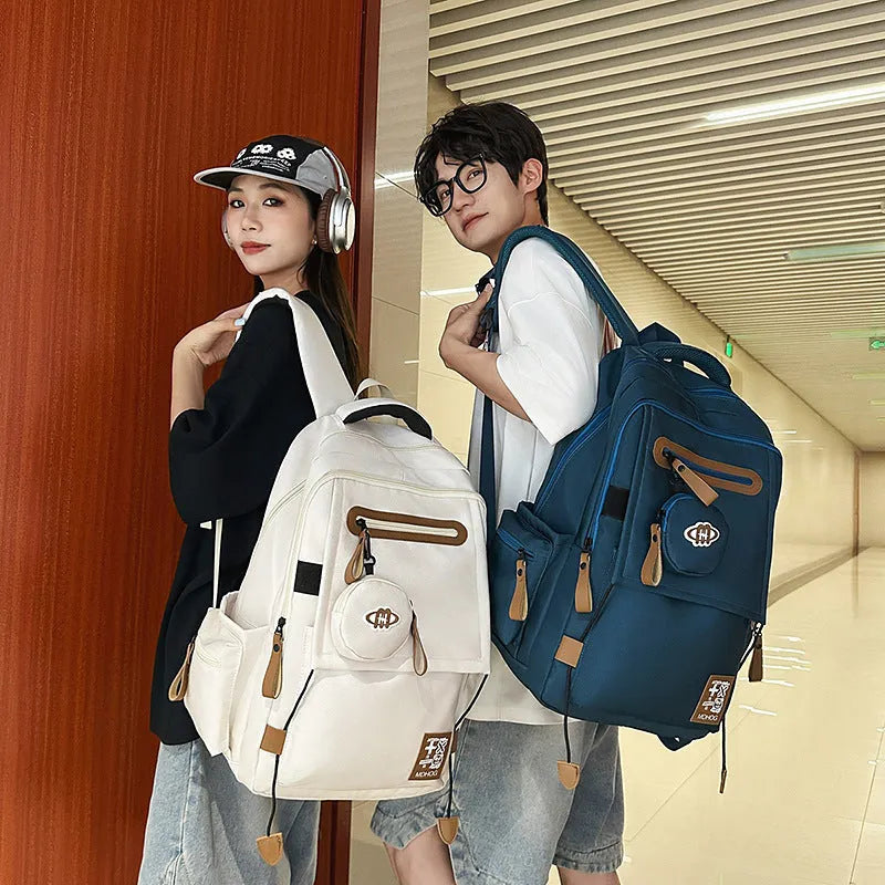 Waterproof nylon travel backpack with contrast stitching in five colour options