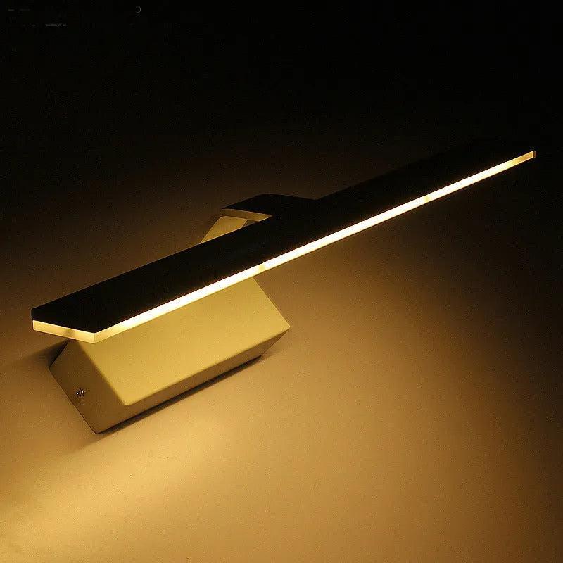 White LED illuminated bathroom mirror headlight mounted on wall, showing even light distribution across its length.