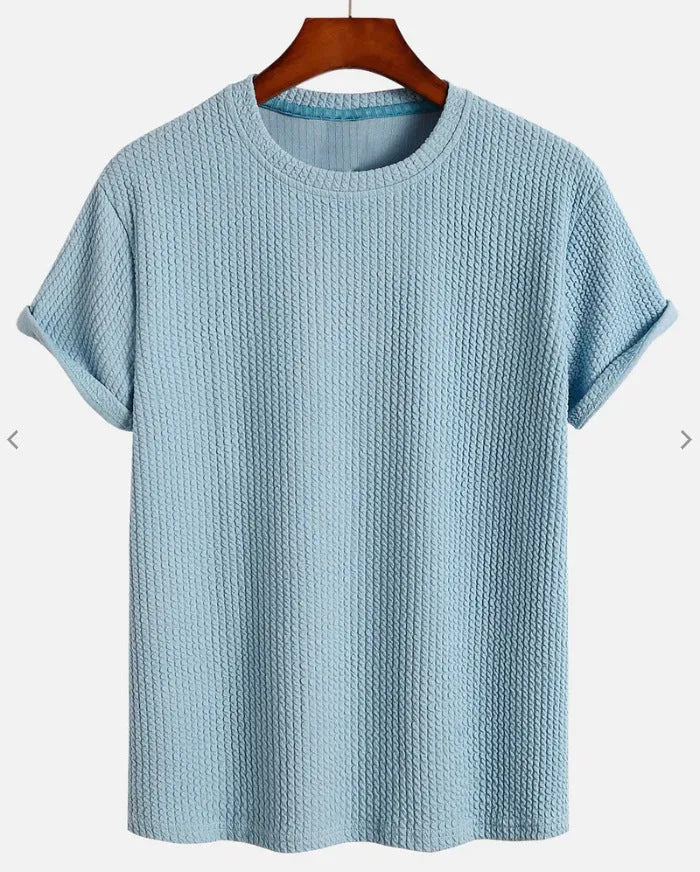 Men's solid colour loose round neck T-shirt in chemical fibre blend, available in black and other colours, sizes S to XL