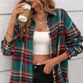 A woman's loose-fit plaid shirt in cotton, shown in black, green, and purple colour options.