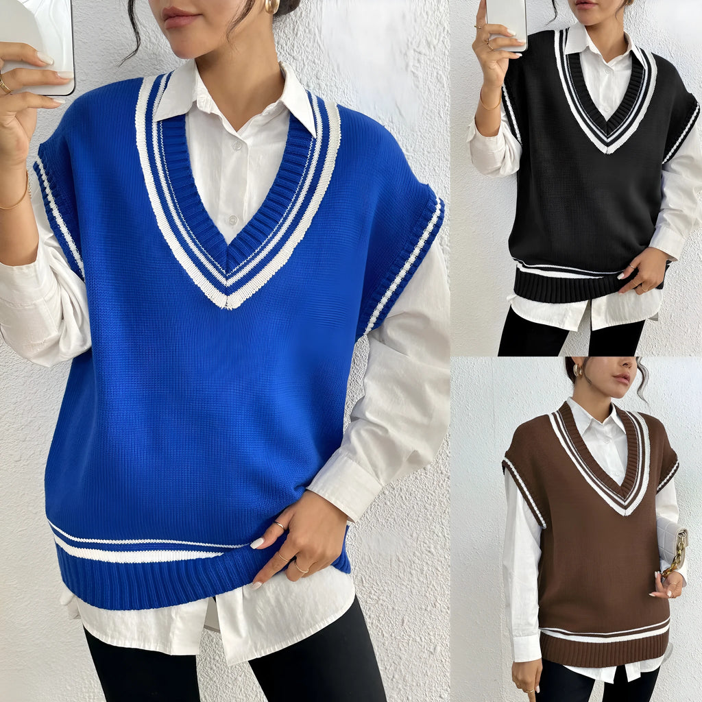 Women's loose blue college-style wool vest sweater, acrylic polyester blend, front view.
