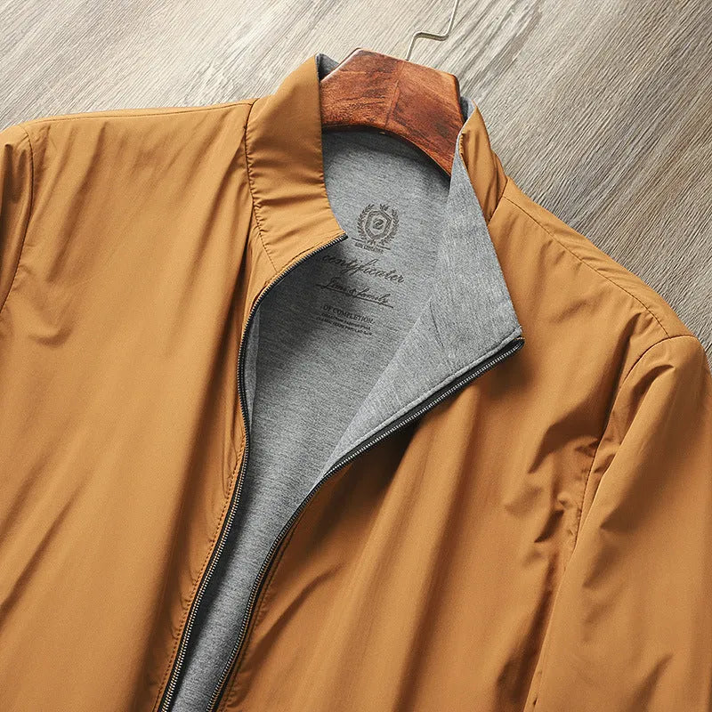 Men's simple stand collar jacket in a polyester-cotton blend, shown in one of four available colours.