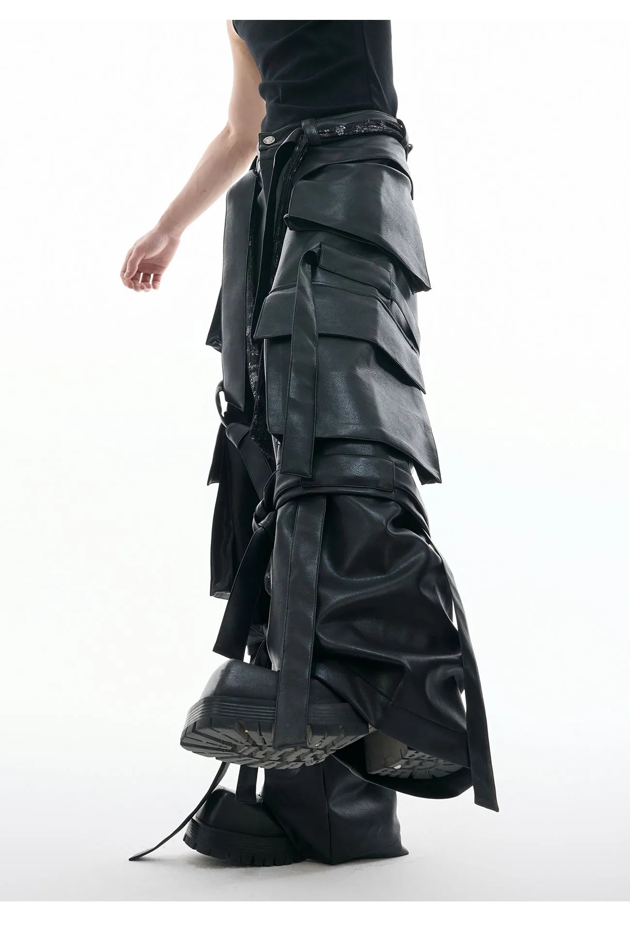 Black loose-fit multi-pocket trousers with quilted stitching detail.