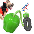 Plastic dog molar toy with food dropping ball in green apple colour for outdoor enrichment