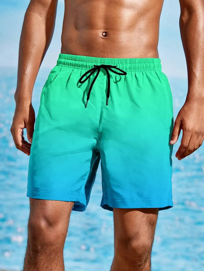Men's grey gradient colour 3D digital print mesh sports shorts on a white background.