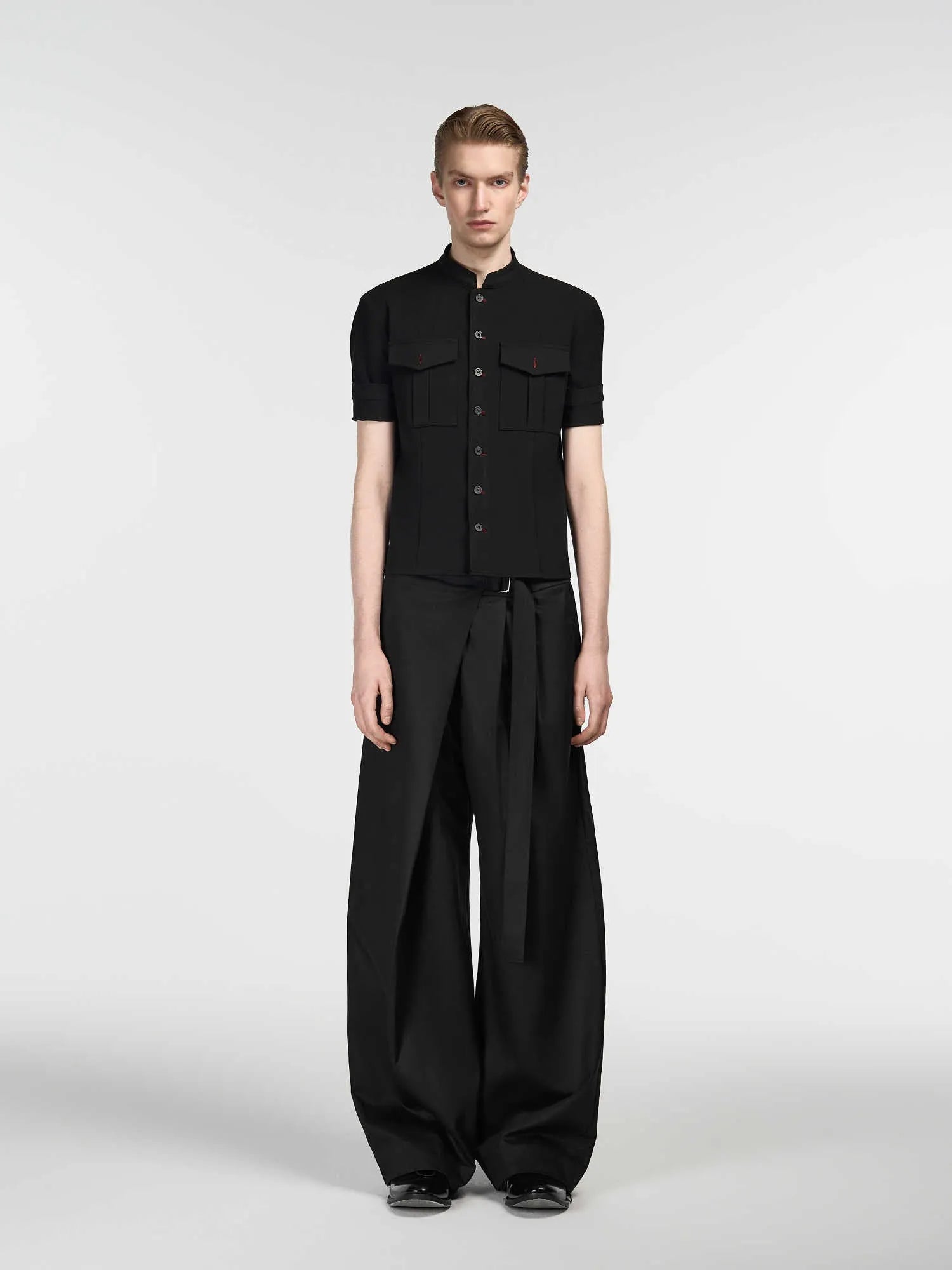 Black straight-leg trousers with adjustable waistband and single pleated front detail