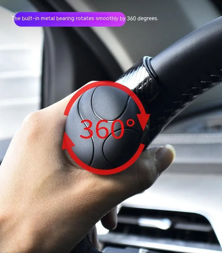 Steering wheel assist ball with silicone grip and metal bearing for single-hand steering control