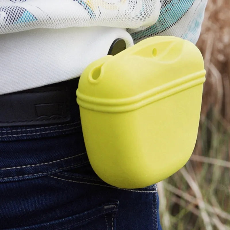Silicone dog training treat waist bag with clip, shown in various colours.