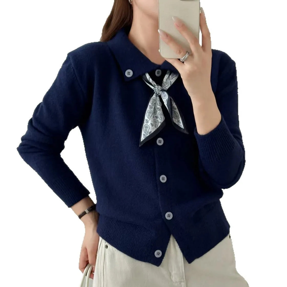 Lapel scarf sweater cardigan in acrylic knit, shown in milky white with splicing detail and long sleeves.