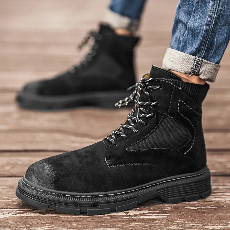 Men's ankle-high Martin boots in frosted sand leather with thick rubber sole and round toe.