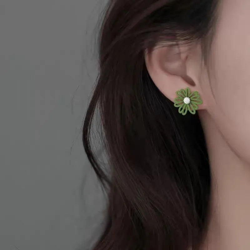 Women's flower stud earrings in blue and orange, white and green, or yellow and white two-tone colour combinations