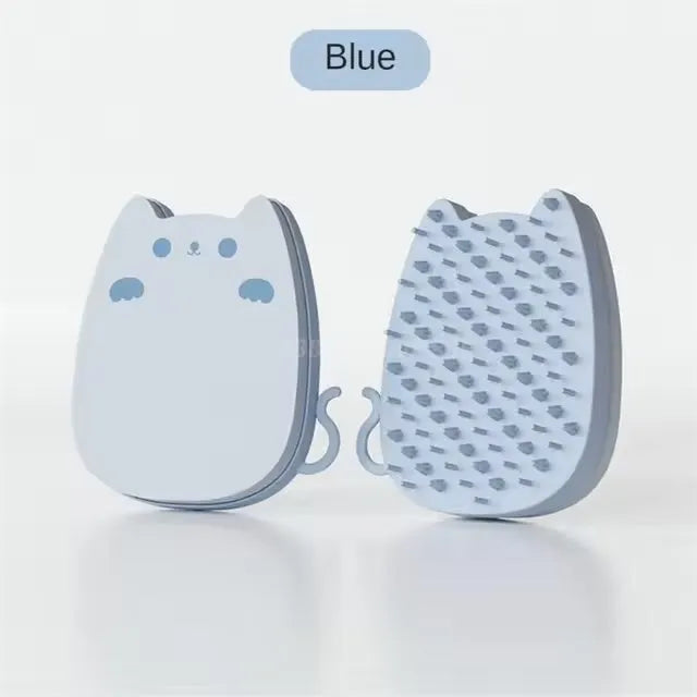Blue silicone pet grooming comb sponge with dual-texture bristles on a white background.