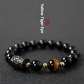 Obsidian and tiger eye bracelet with 10mm beads and circle design