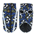 A geometric blue quilted dog jacket with reflective trim on a large breed dog.