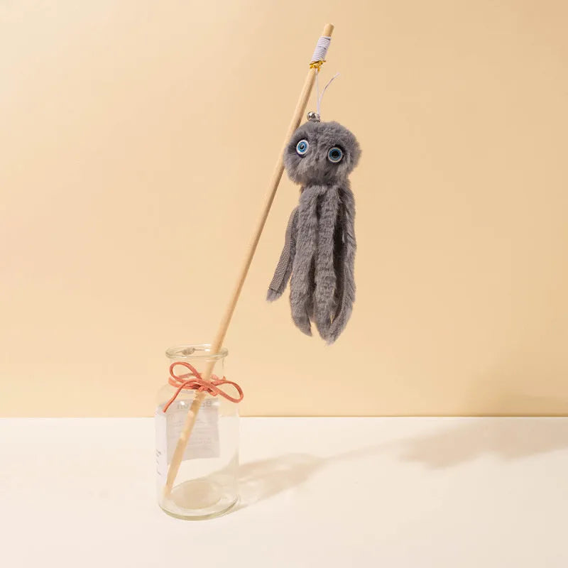 Octopus-themed cat toy with long stick handle in grey, pink, purple, or red colour options