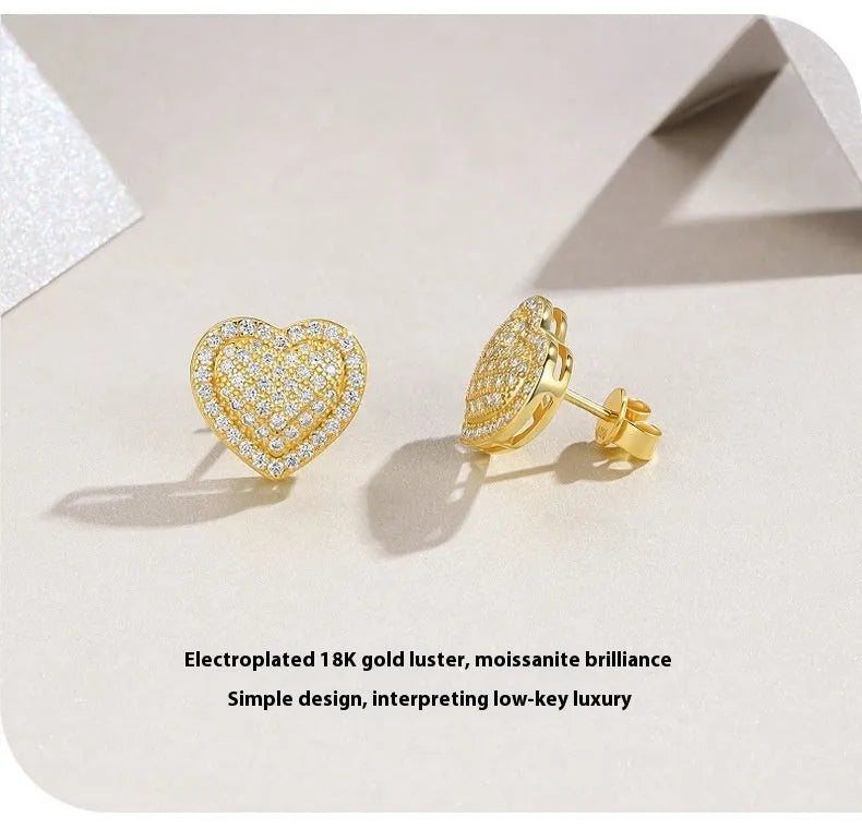 Gold tone heart-shaped stud earrings with clear moissanite stone on S925 silver base