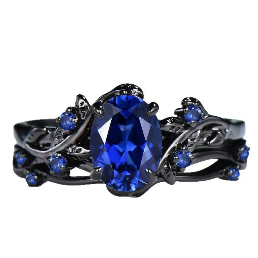 Women's gun black geometric ring with navy blue rhinestone decoration on copper base