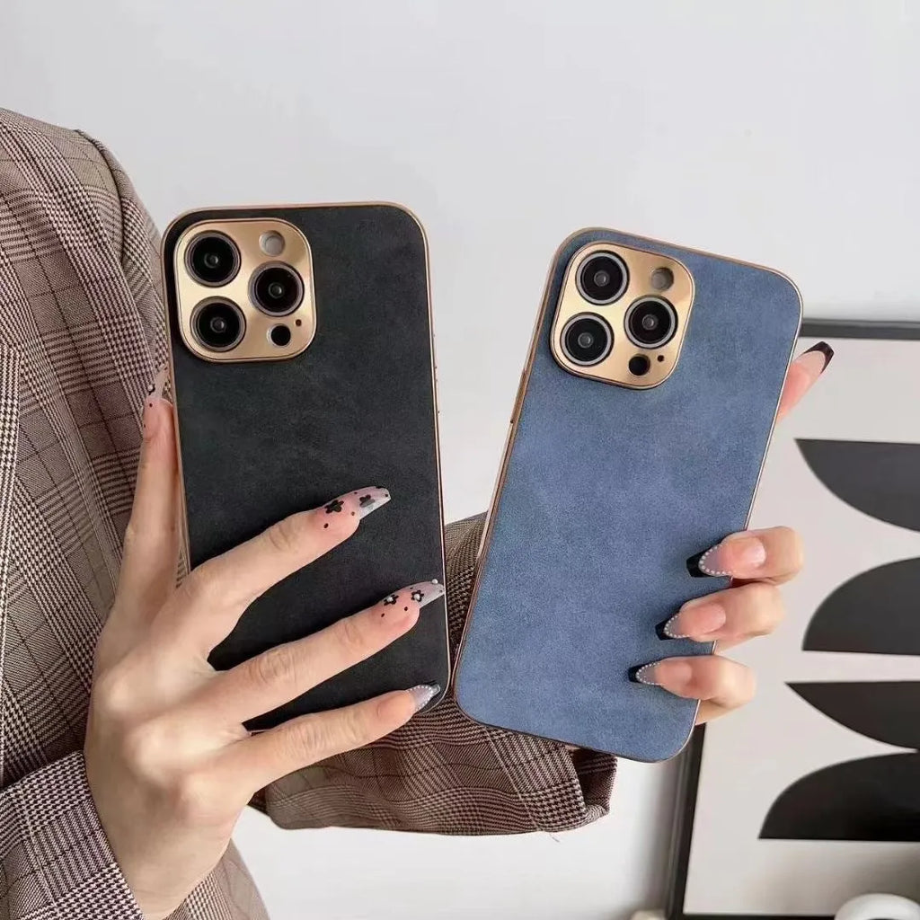 Slim black leather texture phone case fitted on an iPhone 14, showing textured finish and precise camera cutouts.