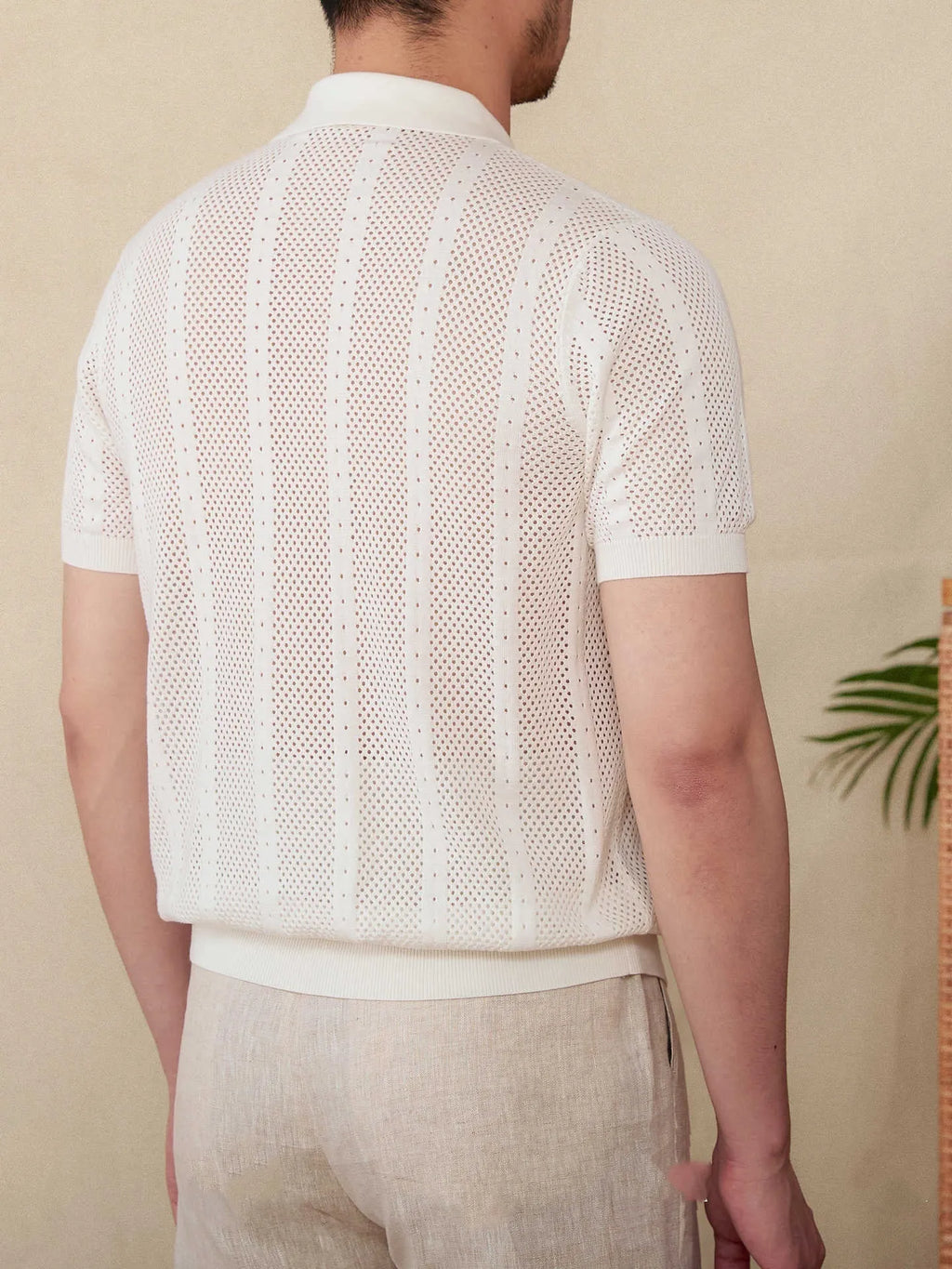Men's short sleeve lapel cardigan in striped pattern with 100% cotton construction