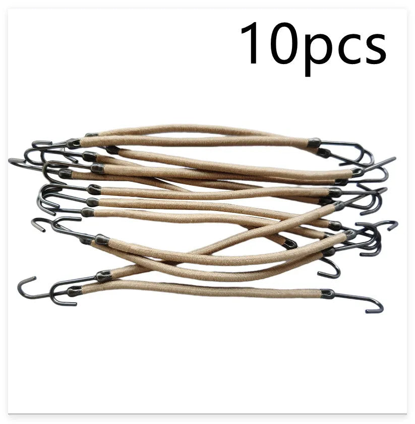 Close-up of a black double hook hair tool for fastening wigs and hair weaves.