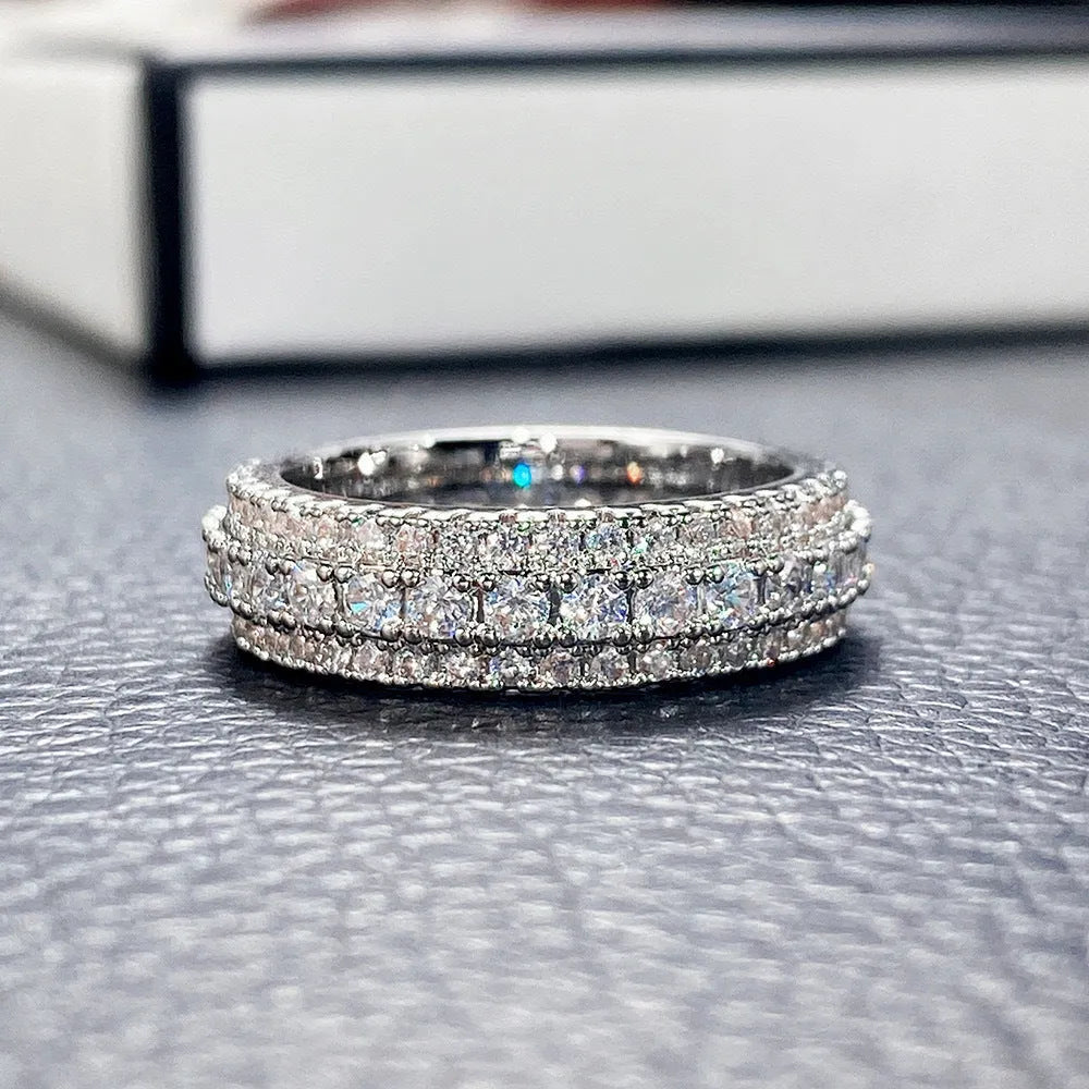 Geometric personalised ring with triangular design and zircon stone, shown in a gold colour finish.